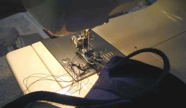 دلیل جمع شدن نخ زیر چرخ خیاطی چیست